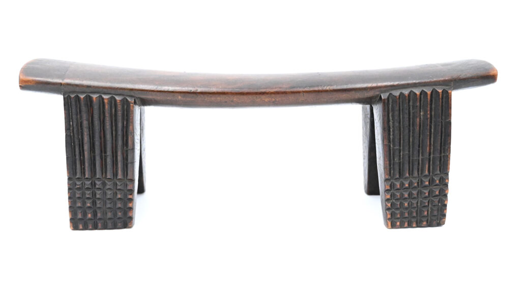 wide wooden headrest with four feet