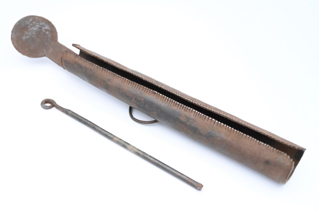 Tube shaped metal with beater