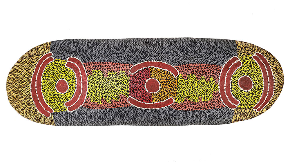 exterior of oval shaped bowl decorated with dot painting