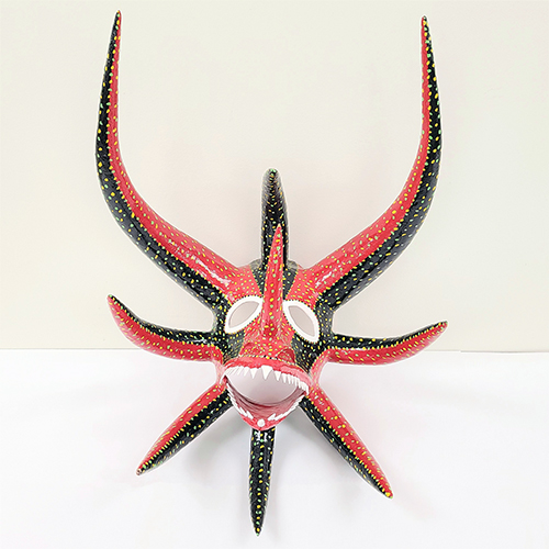 Vejigante carnival mask with many protruding horns