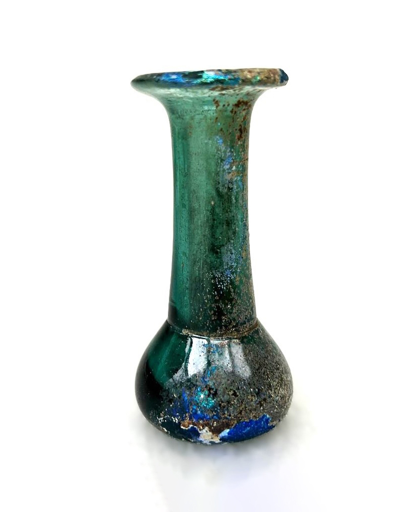 Roman tear bottle, a small green glass vial