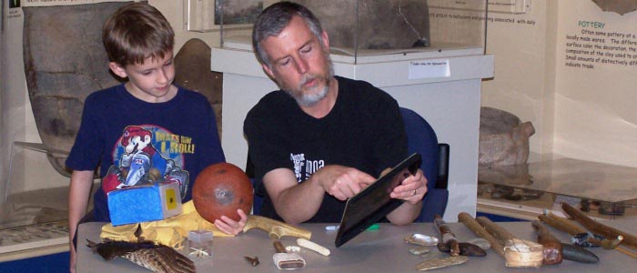 Adult teaching child