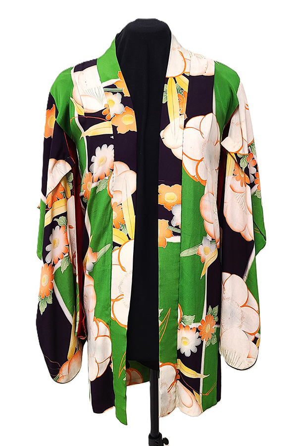 Green coat with oversized floral pattern
