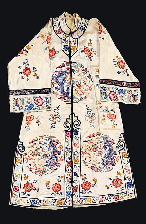 White silk robe with embroidered medallions